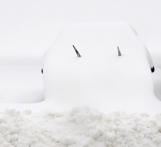 Juan Garcia's Transit Kombi buried under 16 feet of snow.